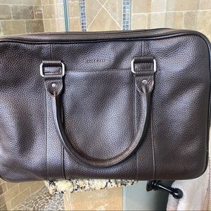 Cole Haan brown bag. Lightly used. Some signs of wear on handles.